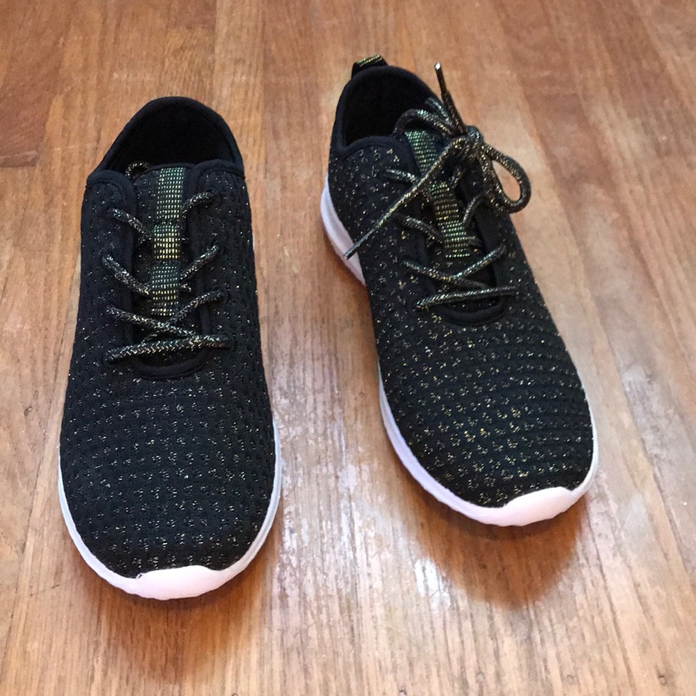 Black and gold sneakers